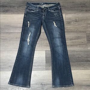 Premiere Low Rise Dark Blue Distressed Bootcut Jeans